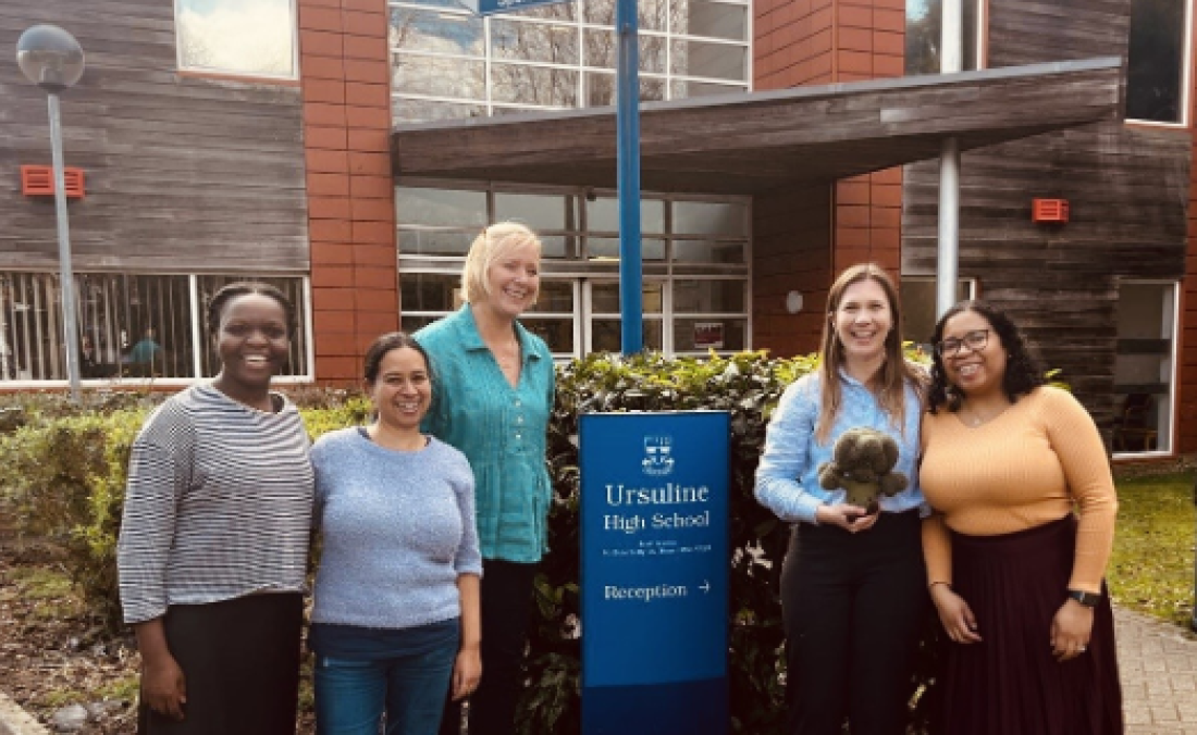4 members of the NIHR King's Clinical Research Facility and a PPI member stood outside Ursuline High School