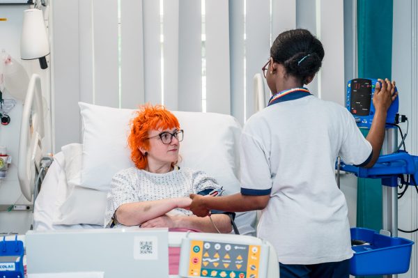 NIHR King's Clinical Research Facility nurse with patient