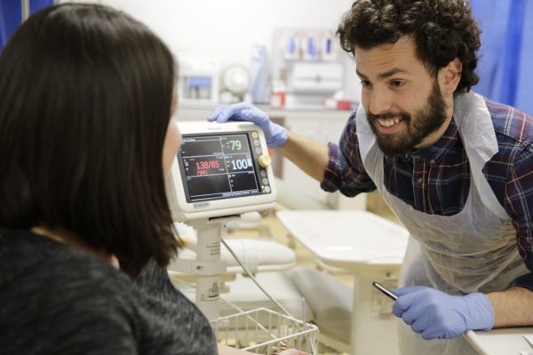 Nurse speaking to patient