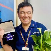 Dani Nebres with Cavell Star Award and flowers