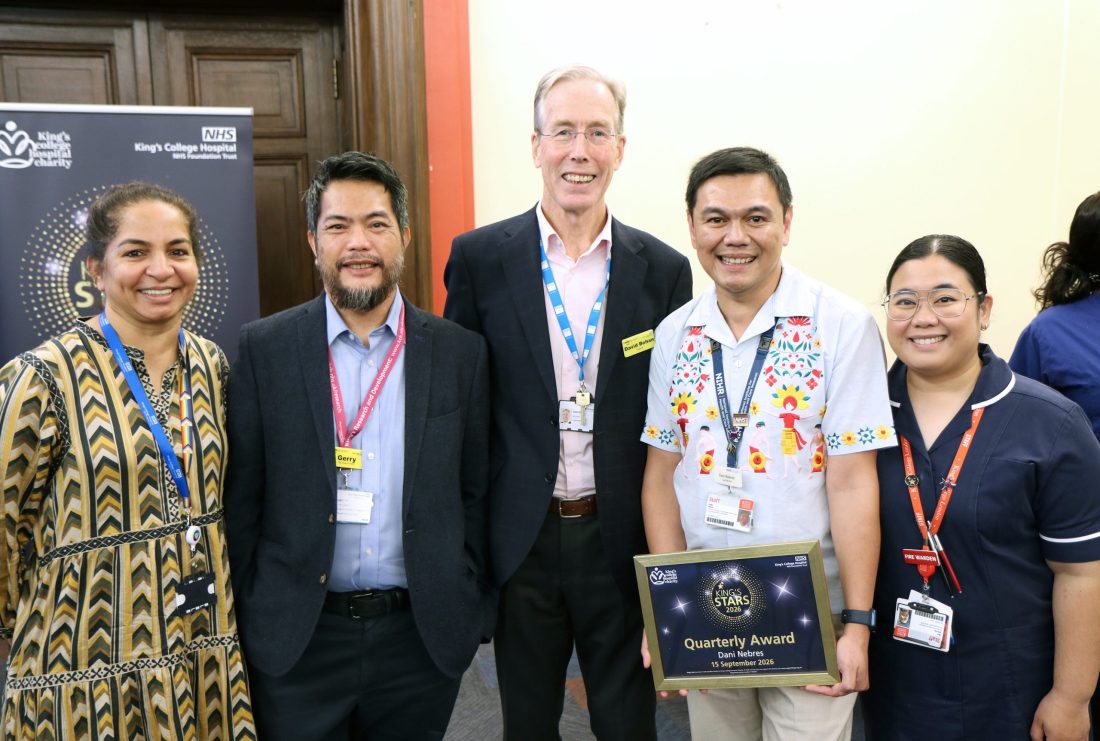 Dani Nebres standing next to four colleagues from King's College Hospital NHS Foundation Trust